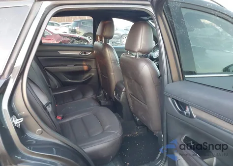 2021 Mazda Cx-5 Signature z USA, uszkodzony, nr VIN JM3KFBEY6M0358024